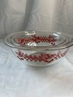 Side view of one Pyrex bowl showing cherry pattern