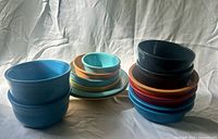 All 14 Fiesta bowls stacked, showing color range and size variations