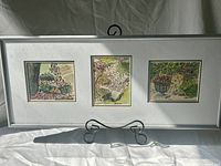 Full view of framed triptych