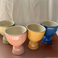 Four pastel Hankscraft double egg cups front view