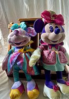 Both Minnie Mouse Main Attraction plushes standing side by side
