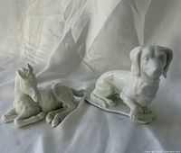 Both figurines side by side for scale and overview