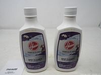 Front view of both sealed Hoover Paws & Claws Spot Cleaner bottles