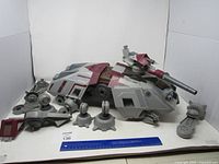 Full view of tank with loose repulsorlift pods and ruler for scale