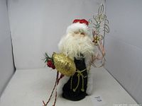 Full view of Santa figure with accessories
