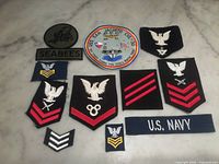 All eleven patches laid out on surface