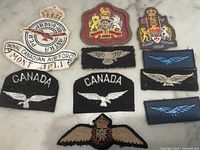 All ten RCAF patches laid out on surface showing variety