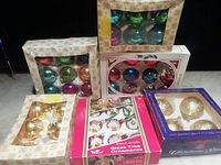 All six boxed sets of ornaments displayed