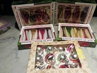 Front view showing four ornament boxes: two boxes of elongated tear-drops and box of round ornaments