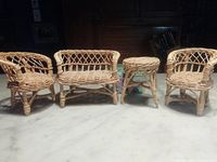 Front view of settee, two armchairs, side table