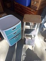 3-drawer organizer and 2-step stool side by side