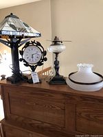 All three main items plus extra shade on wooden surface