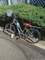 Right side view of Electra Townie bike showing basket, rear rack, water bottle, phone mount