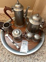 Full view of entire pewter service on tray