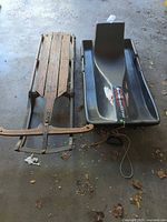 Top view of both sleds side by side, showing overall condition