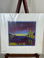 Full view of matted print on easel