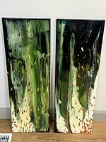 Front view of both abstract canvas paintings