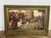 Full view of framed artwork showing image and ornate gold frame