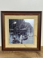 Front view of framed duck print