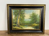 Front view of framed painting showing artwork and frame detail