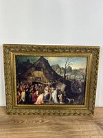 Front view of framed print showing artwork and ornate gold-tone frame