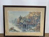 Full view of framed artwork showing image, frame, matting