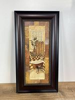 Front view of framed artwork showing image and frame