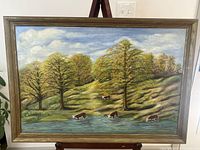 Frontal view of framed landscape painting