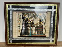 Front view of framed papyrus artwork
