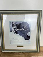 Front view of framed print showing image, mat, frame