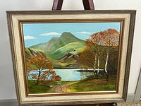 Front view of framed painting showing full artwork and frame