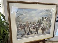 Full view of framed limited edition print under glass