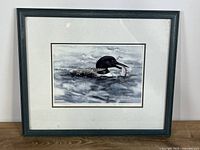 Full view of framed print showing frame, mat, and artwork