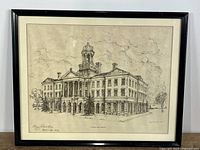 Full view of framed artwork showing image, mat, and black frame