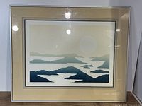 Full view of framed print under glass