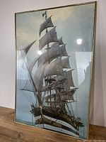 Full view of framed sailing ship poster
