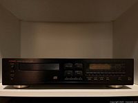 Front view of Luxman D-322 CD player on shelf