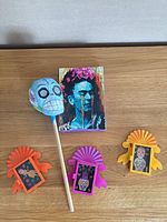 All items grouped: Kahlo print, skull maraca, three niche magnets