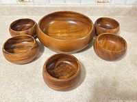 Entire set showing one large and five small bowls