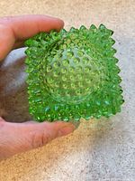 Top angled view showing hobnail pattern and interior well