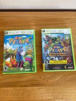 Front covers of both Xbox 360 Viva Piñata games