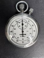 Front view of Marathon stopwatch showing dial and hands