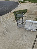 Overall view of box fan, shelving tower and drying rack