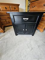 Front view of Klaussner nightstand closed