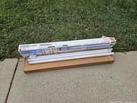 Loose fluorescent tubes with Sylvania and Metalux boxes