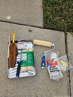 All items laid out on sidewalk showing contents