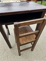 Desk rear view with chair tucked underneath