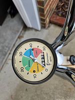 Close-up of Vitamaster speedometer/odometer gauge showing 2,807.2 miles