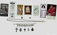Overview of jewelry pieces and prayer cards