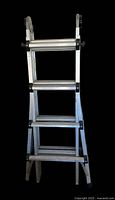 Full view of folded Cosco aluminum multi-position ladder